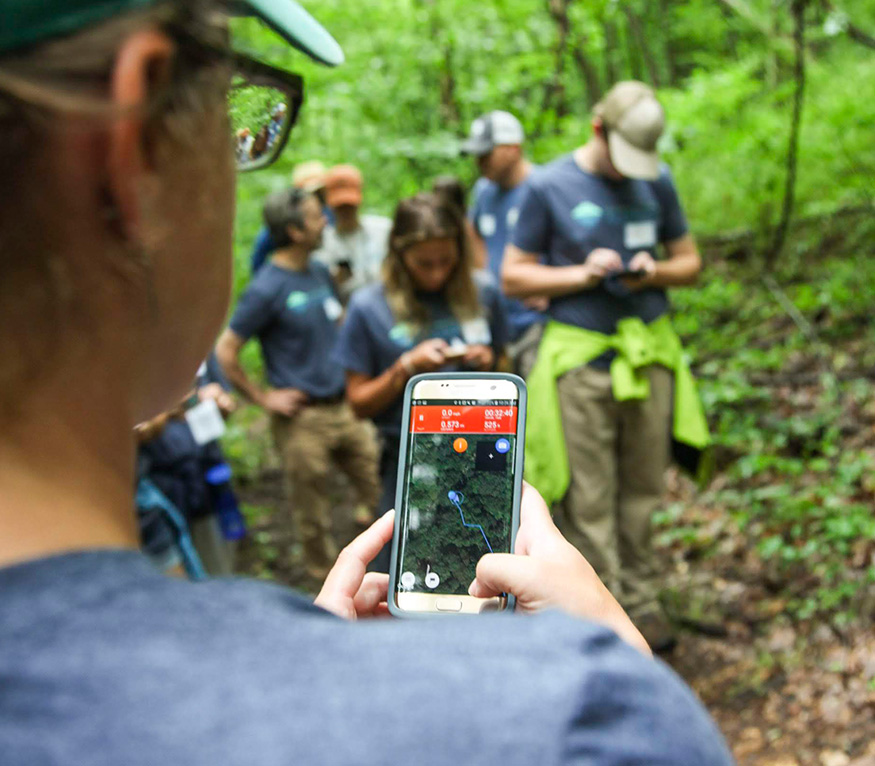 GPS training with students in the woods